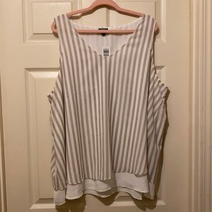 Light, sleeveless blouse with shell to wear with jeans or slacks. Never worn